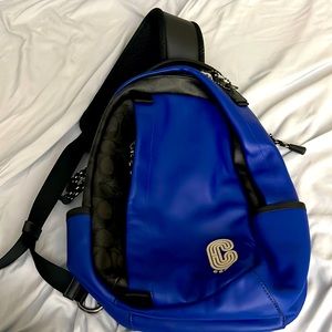 Black and blue Men’s Coach chest bag